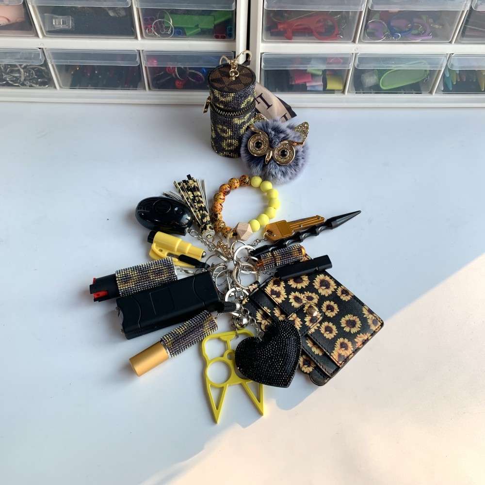 Sunflower Shiny Lightning Keychain 15pcs Keychain Set - Premium self defense keychain set for women's personal safety. Features 15-piece comprehensive set and Multiple defense tools.